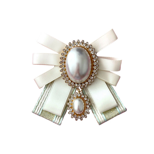 Broche beige con dorado